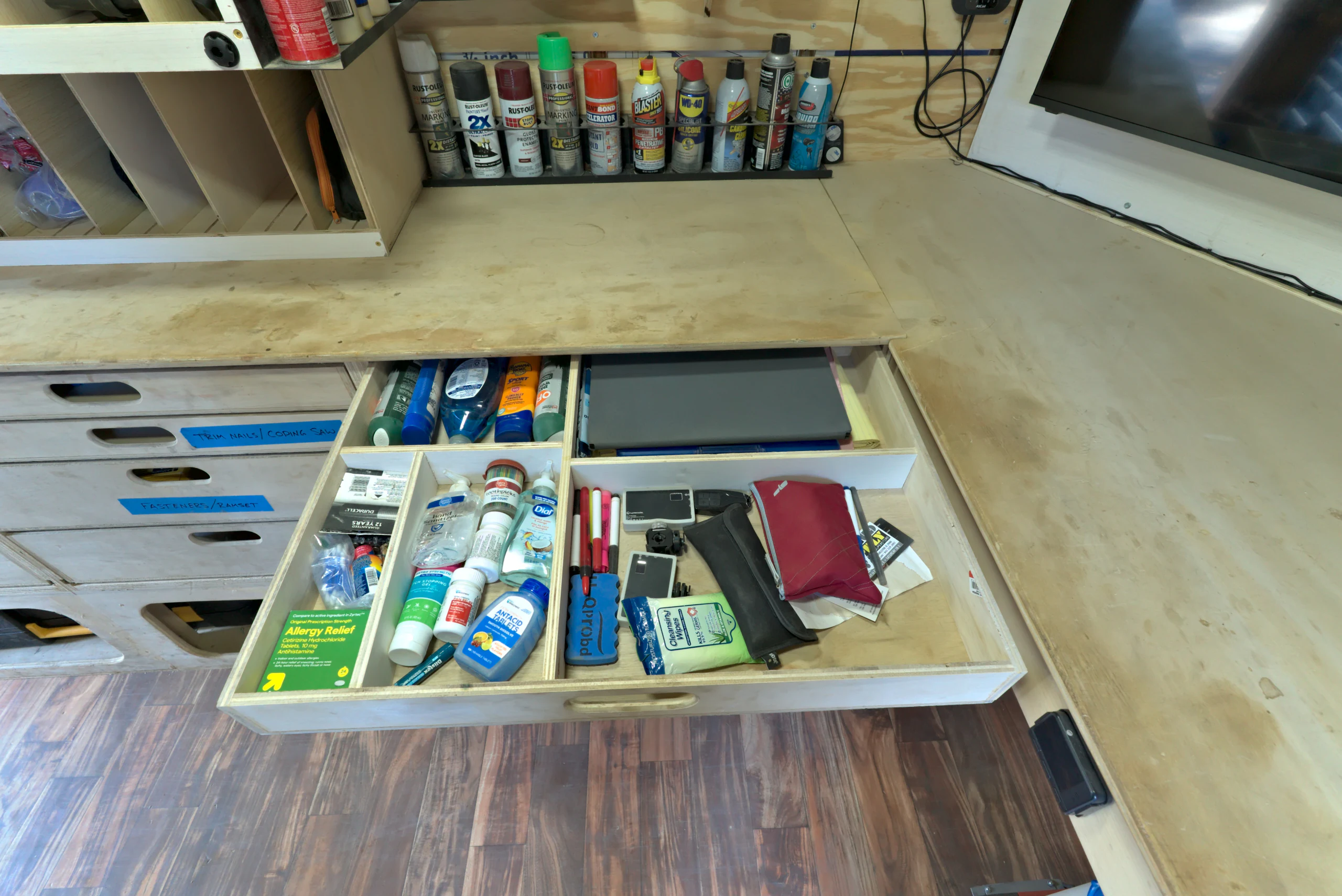Workbench and divided daily-reach drawers inside the Biltout prototype